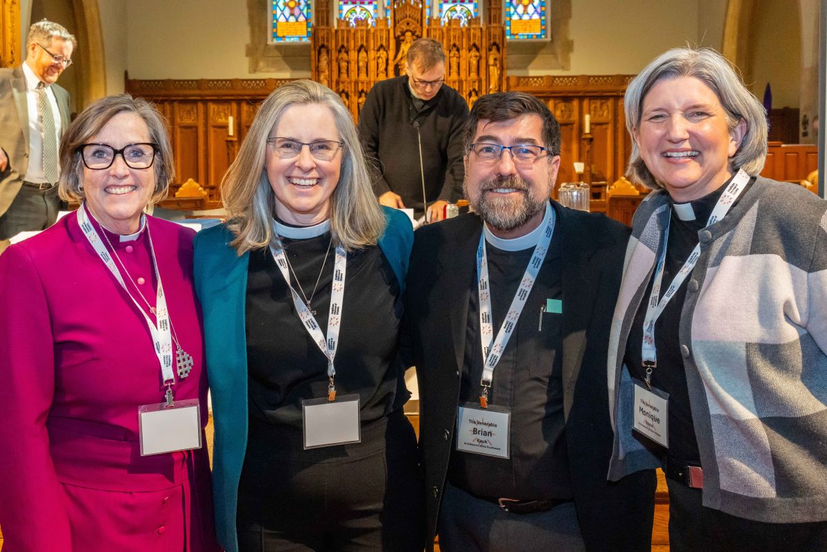 Bishop-elect Kathryn Otley (centre left) poses with Archbishop Anne Germond, metropolitan of the ecclesiastical province of Ontario (left) and fellow candidates in the episcopal election, Archdeacon Brian Kauk (centre right) and Archdeacon Monique Stone (right). Photo: Archdeacon Chris Dunn