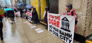 Protesters gather outside 444 York Street to call for the Ontario Teachers' Pension Plan to divest from companies they describe as complicit in Israel's invasion of Gaza. Critics fear that Bill C-9 may have a chilling effect on protests of this kind. Photo: Sean Frankling